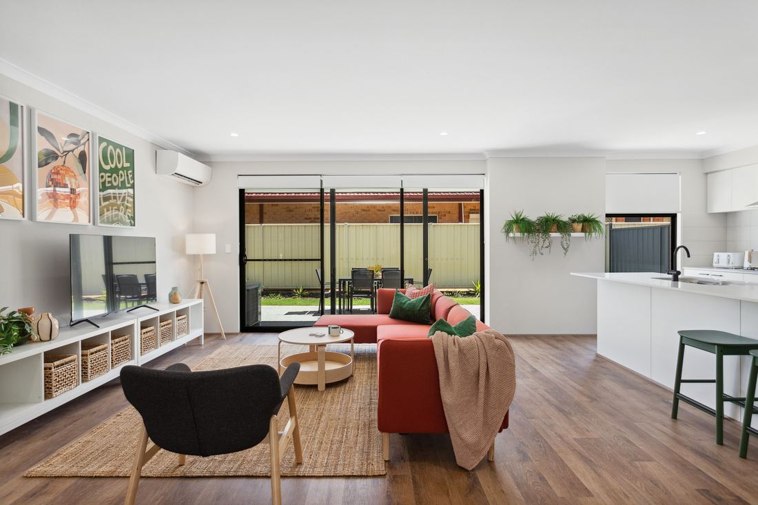 Shared living area with lounge and kitchen