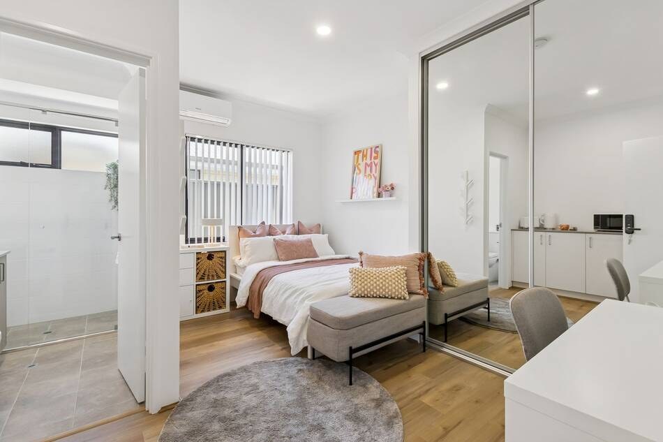 Living Rooms coliving bedroom with ensuite and storage